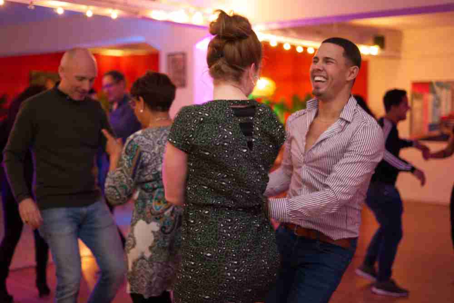 Couple learning to dance salsa